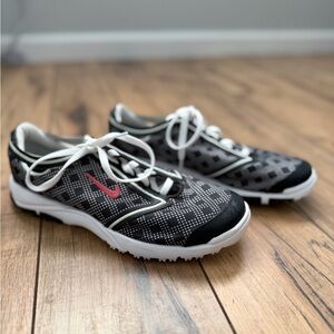 Nike Black and White gold shoes